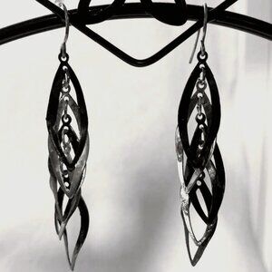DESCENDING FEATHER CUT OUT TWO TONE HANGER EARRINGS